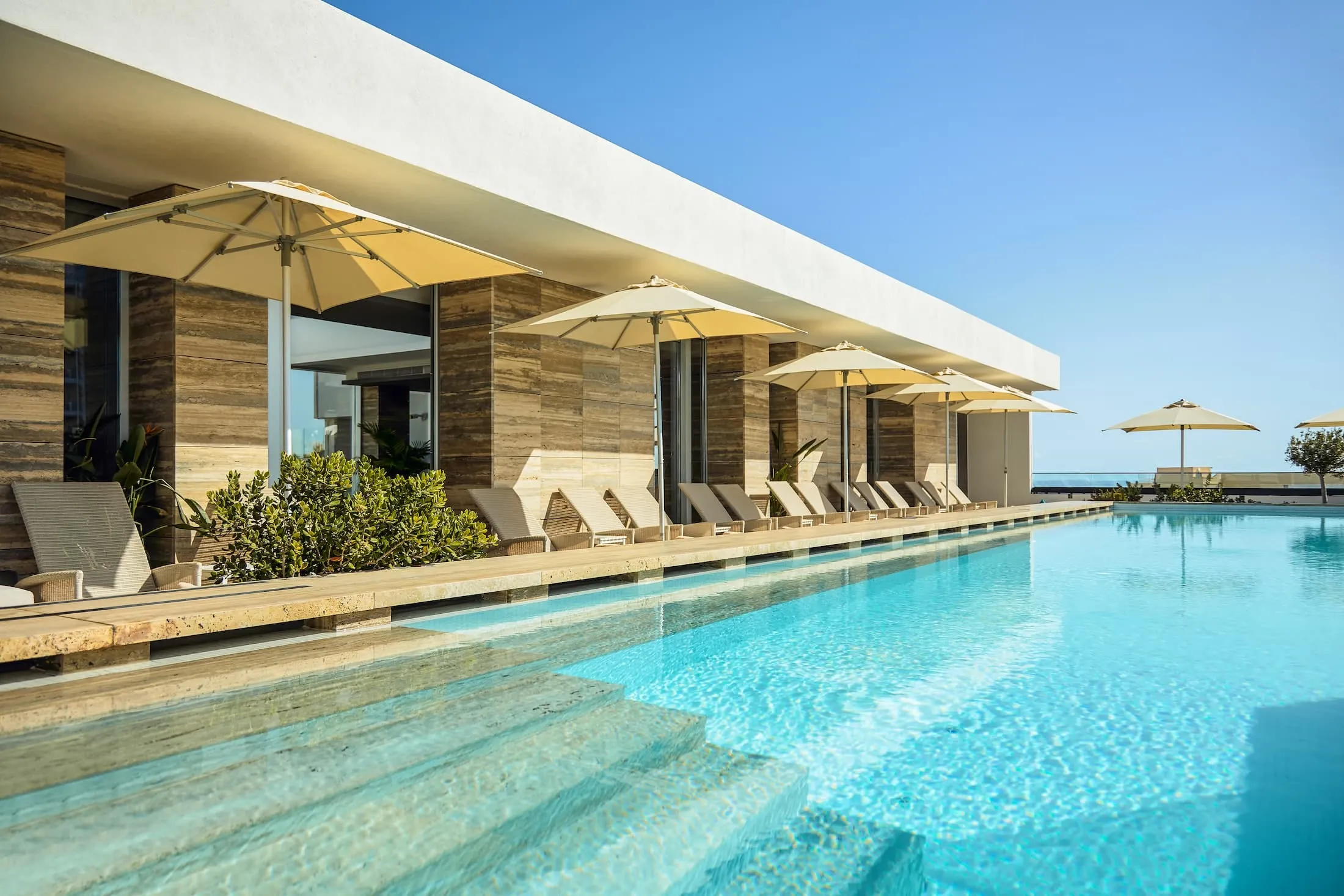 The rooftop pool and sun loungers at Number 11, St Julian’s