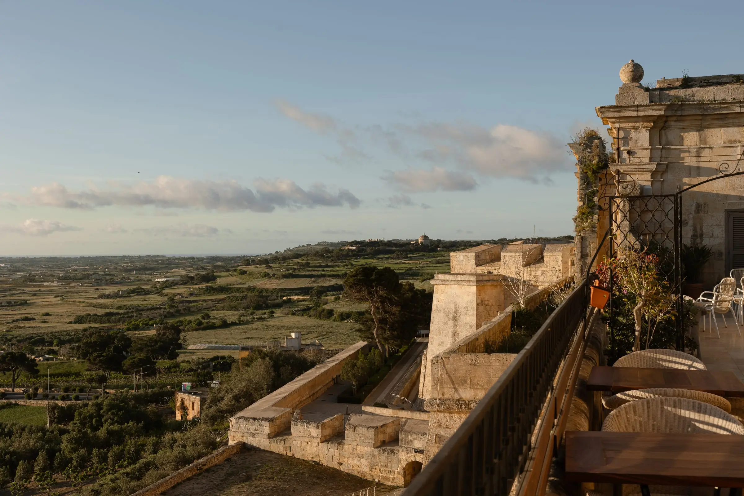 The Xara Palace's terrace on the Mdina bastions, looking out over the countryside