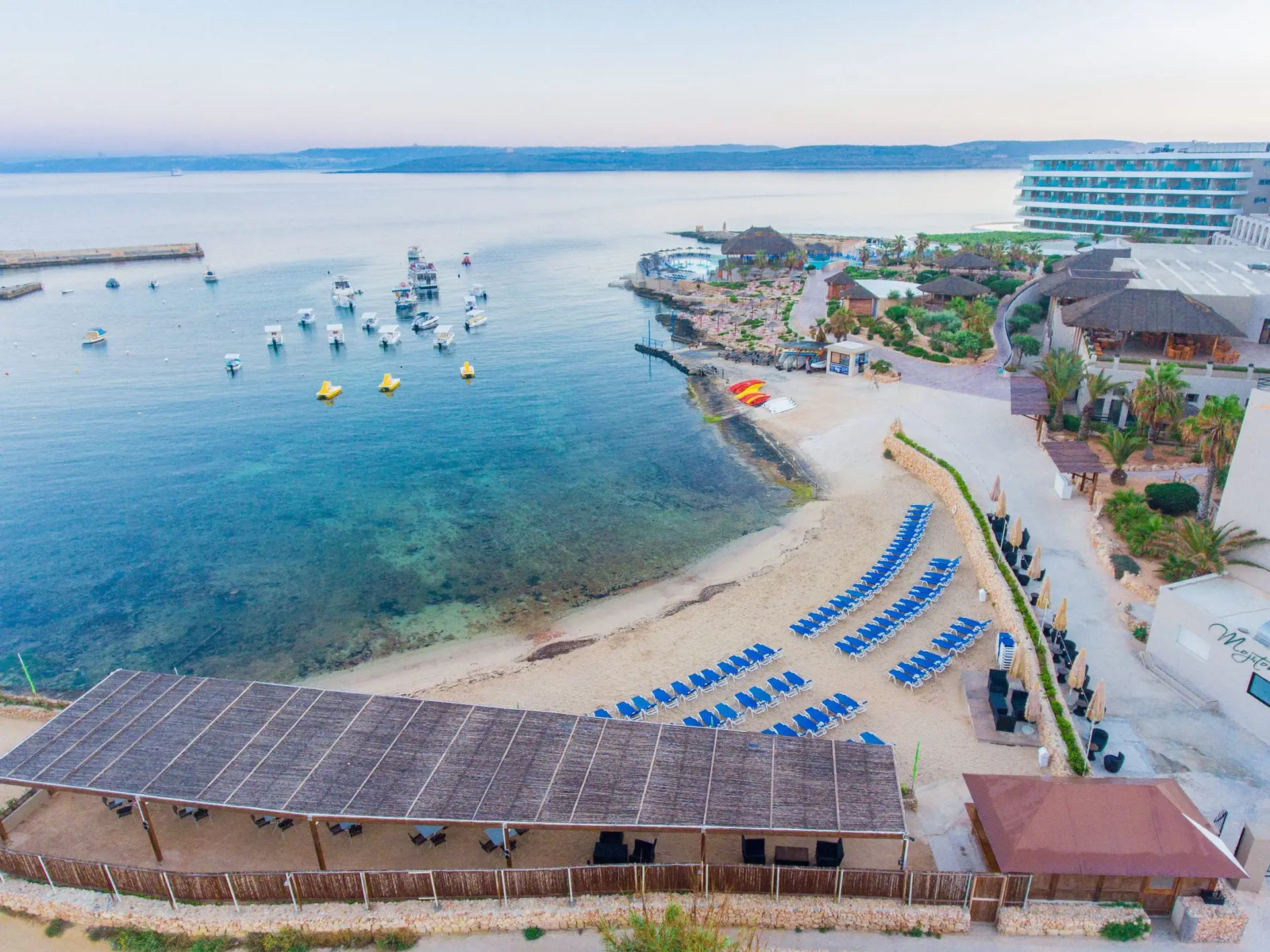 The resort’s private sandy beach from above