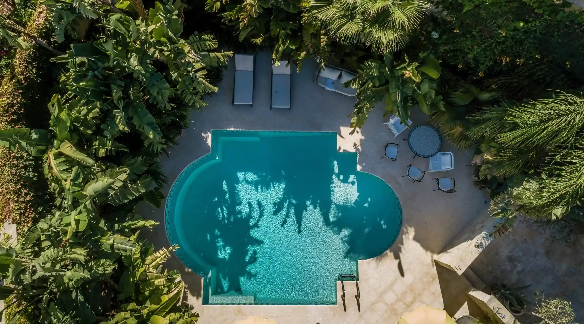 The pool from above, among the garden’s trees