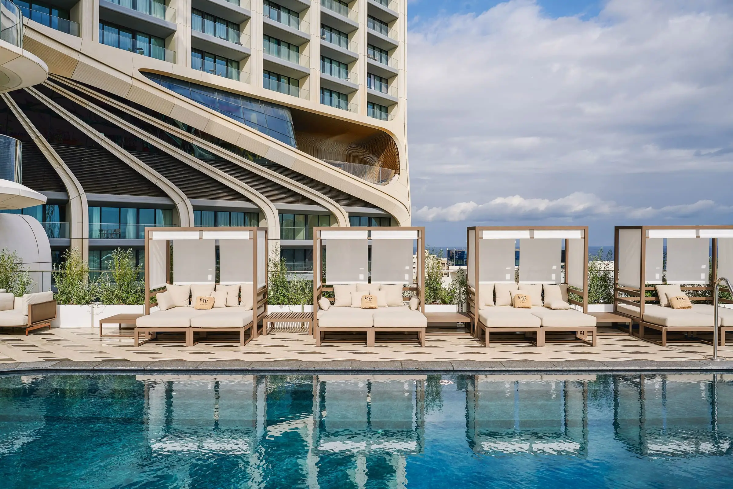 The rooftop pool with its cabanas