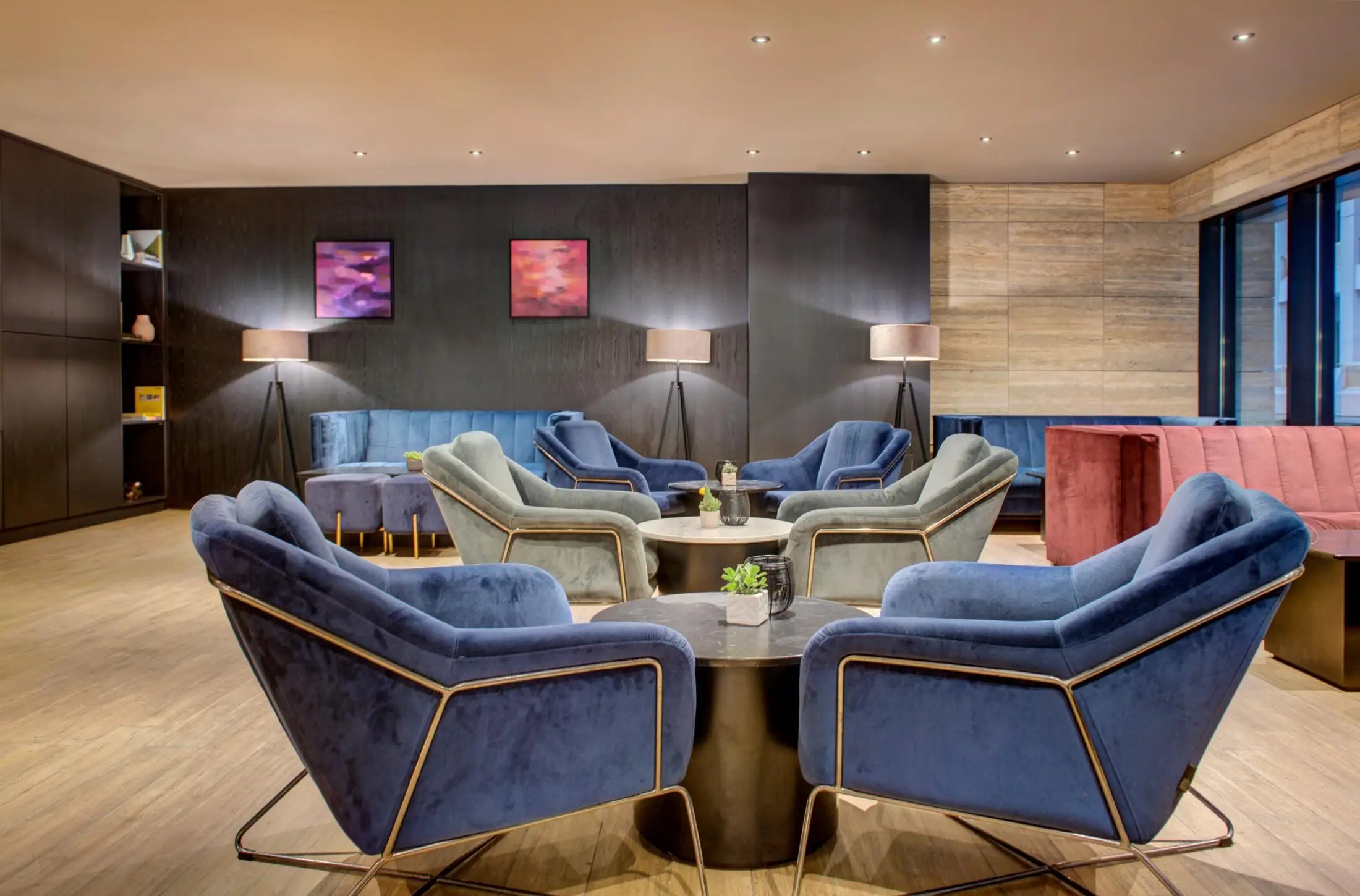 Armchairs in the first-floor social hub lounge at Number 11