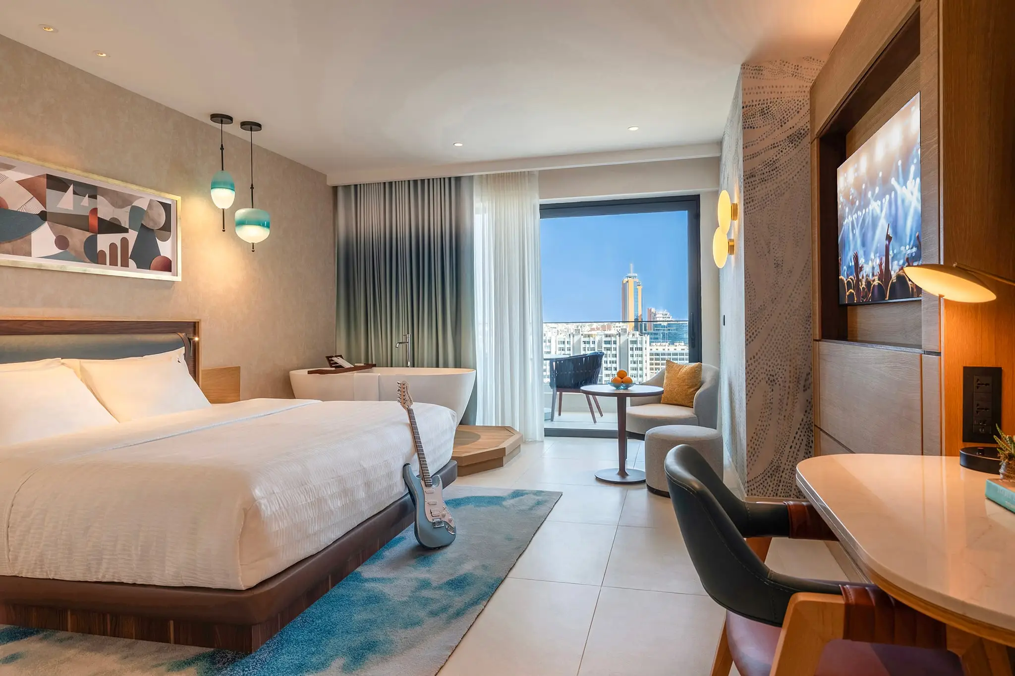 A deluxe room with a view over the sea at St Julian’s