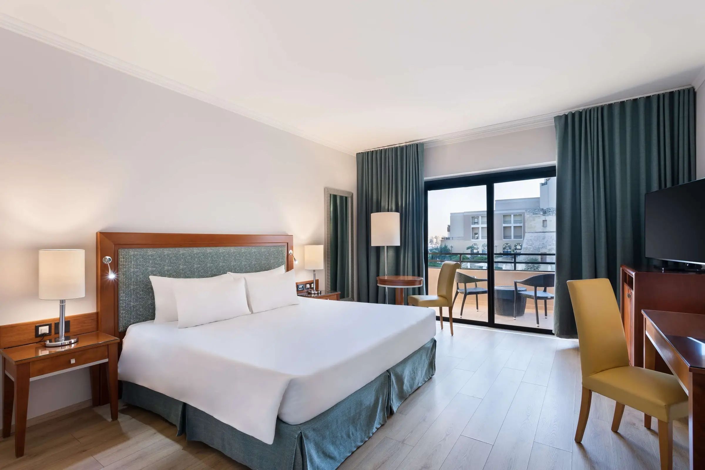 A standard room at the Radisson Blu Resort, St Julian’s, with a balcony