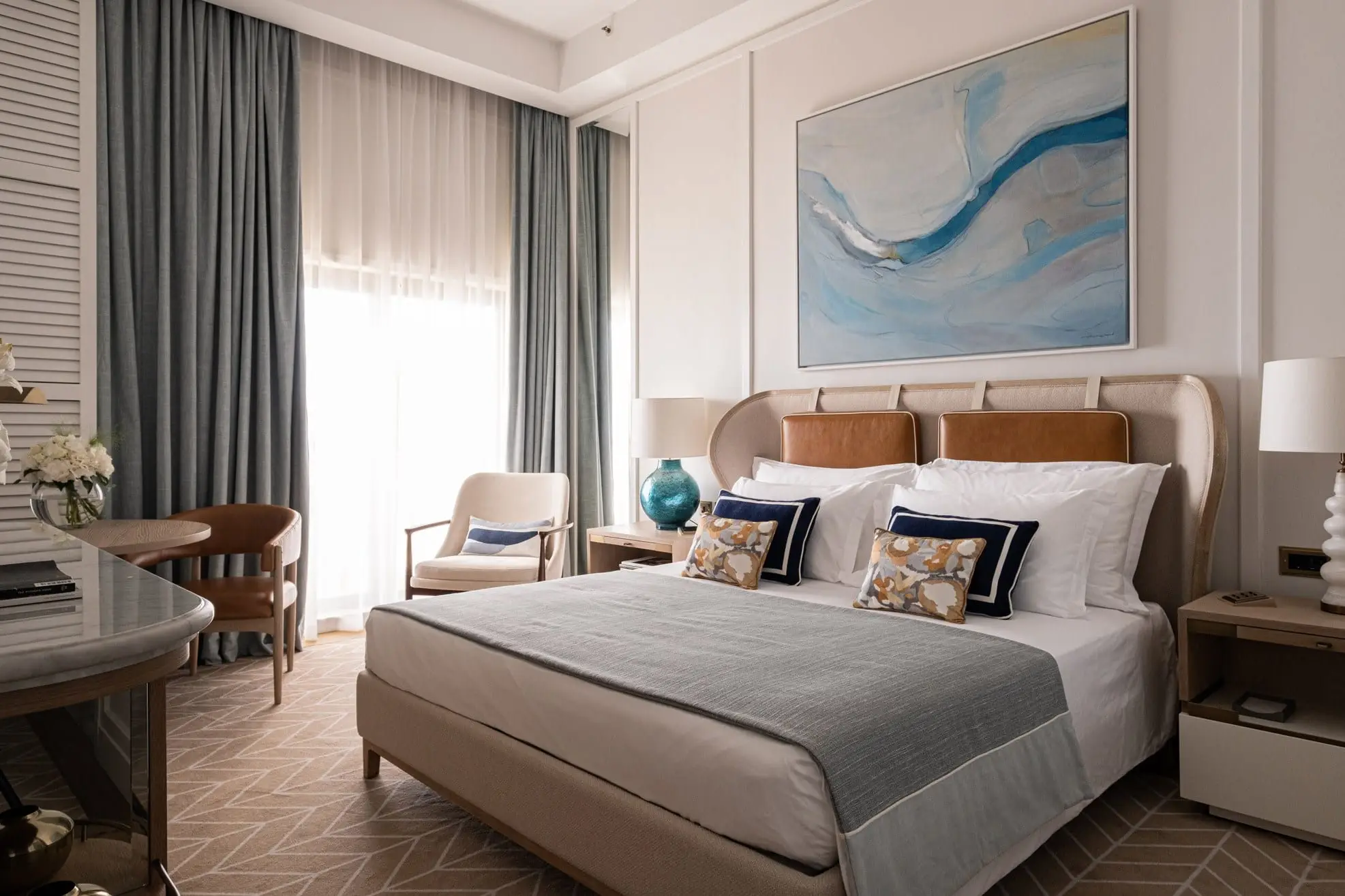 A Premium room with a double bed and a seating corner