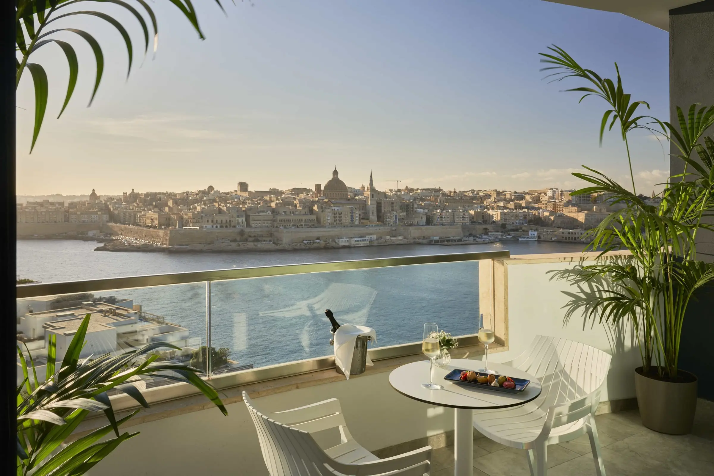 A room’s terrace looking across the harbour to Valletta