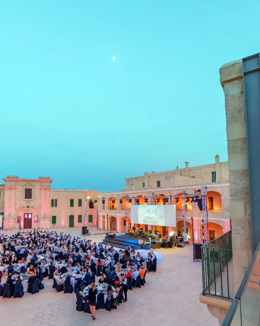 A gala dinner staged in the parade ground of Fort St Elmo at dusk