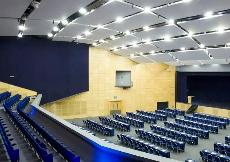 The Grandmaster’s Suite set classroom style below its tiered balcony