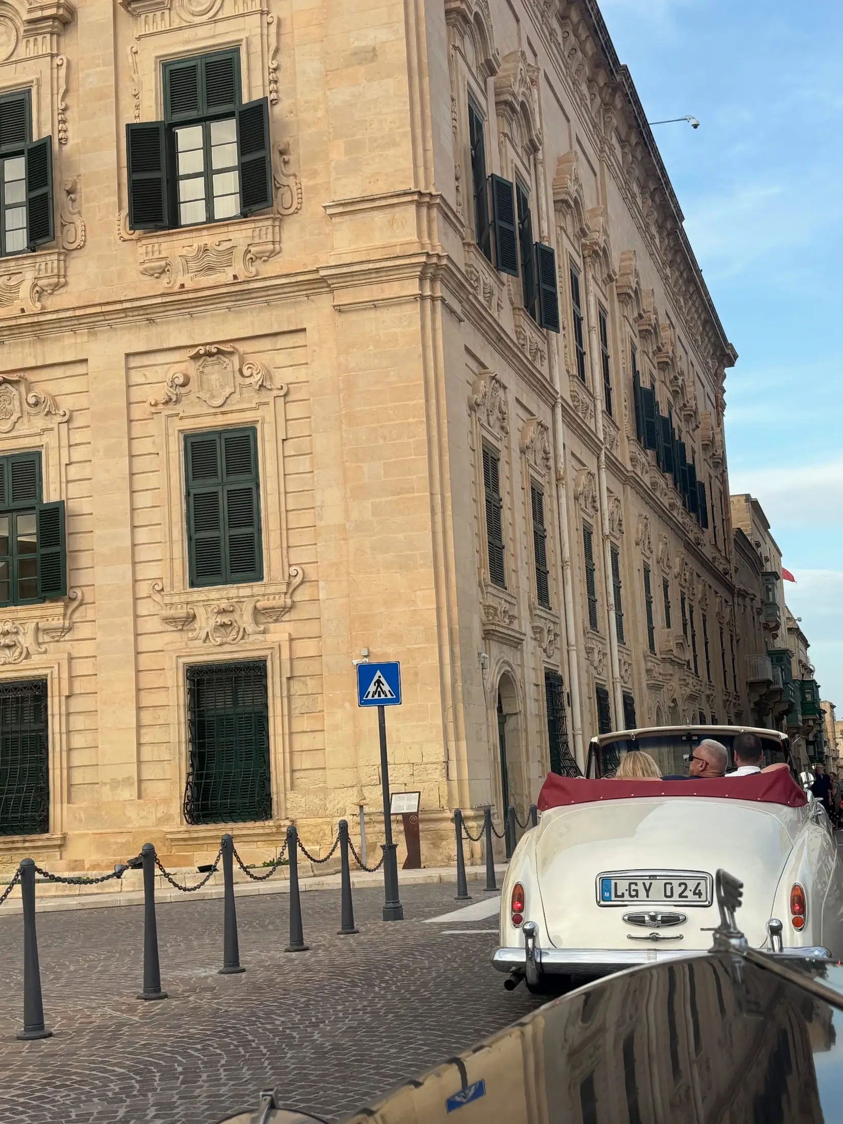 A 1956 Rolls-Royce Silver Cloud drophead waiting on a Valletta street