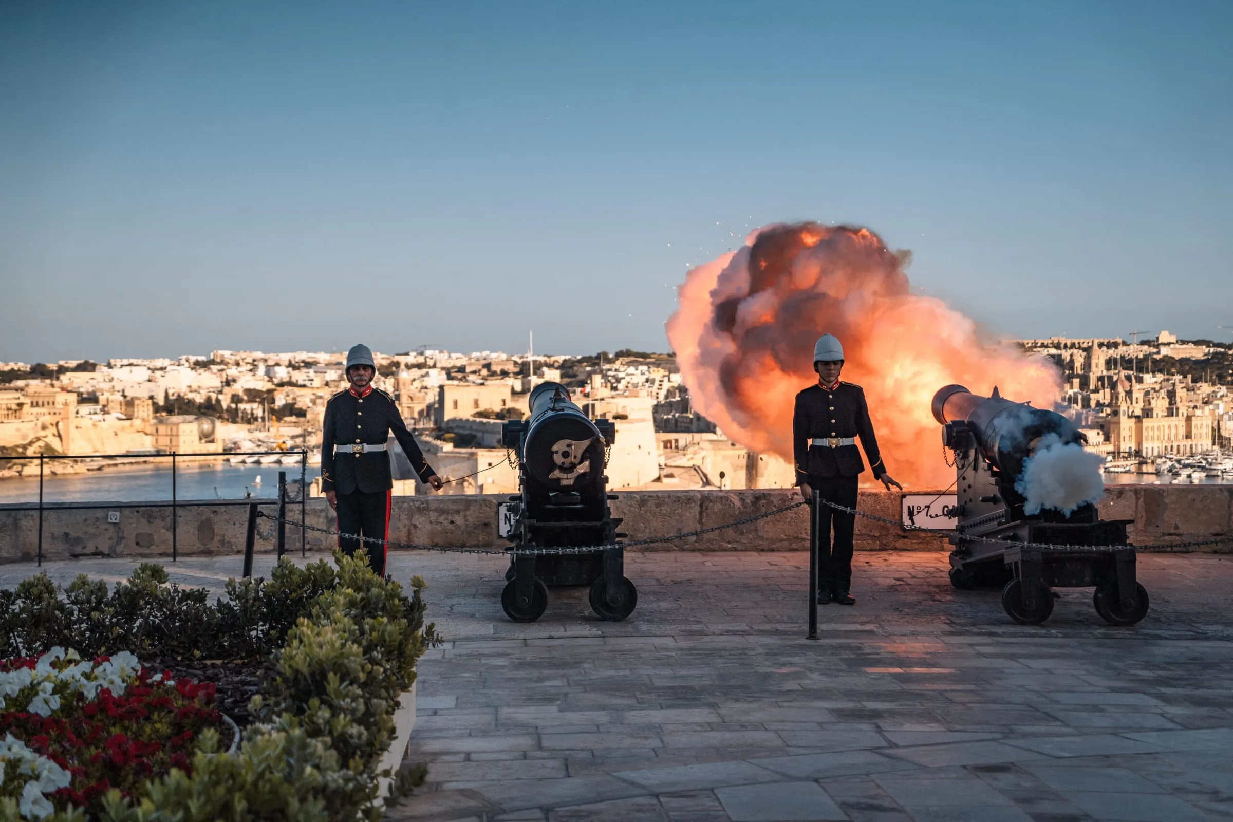 A gun of the Saluting Battery fired at dusk over the Grand Harbour