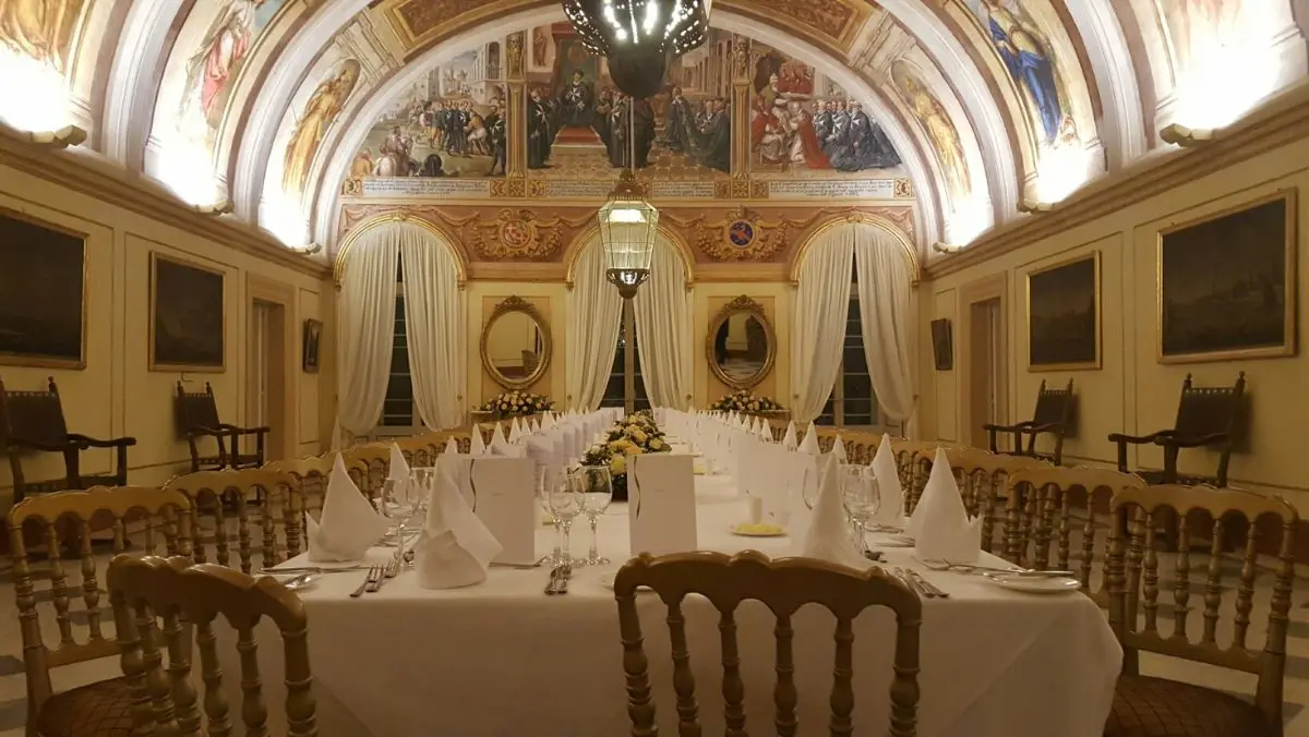 A formal dining setup in a grand room within the Verdala Palace in Malta