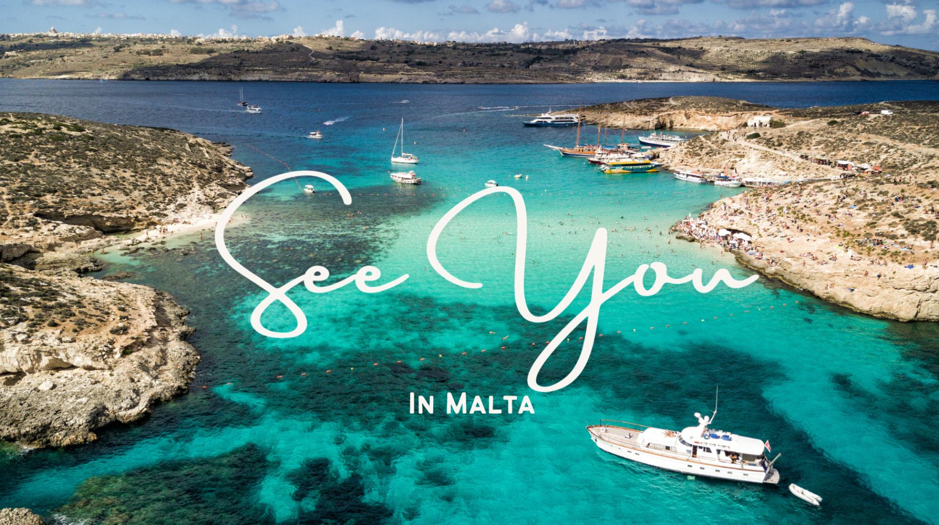 Picture of the blue lagoon, with small boats peppered across the coast