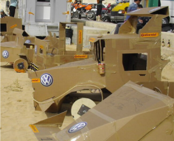 A workshop activity where teams have to build vehicles out of cardboard